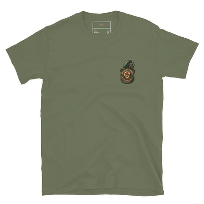 Military green T-shirt with front pocket-sized graphic of a xenomorph coiled around McLaren Tee Hub logo.
