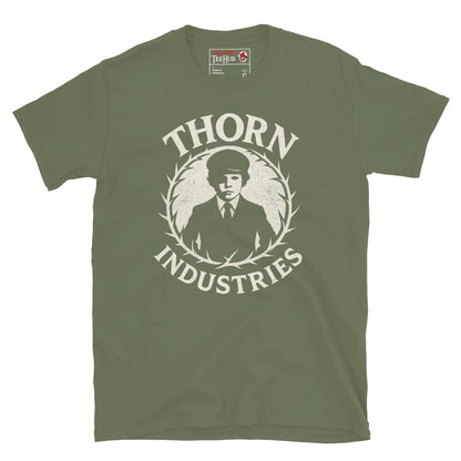 Military Green T-shirt featuring the fictional "Thorn Industries" logo with a silhouette of Damien Thorn from The Omen, surrounded by a thorny wreath.