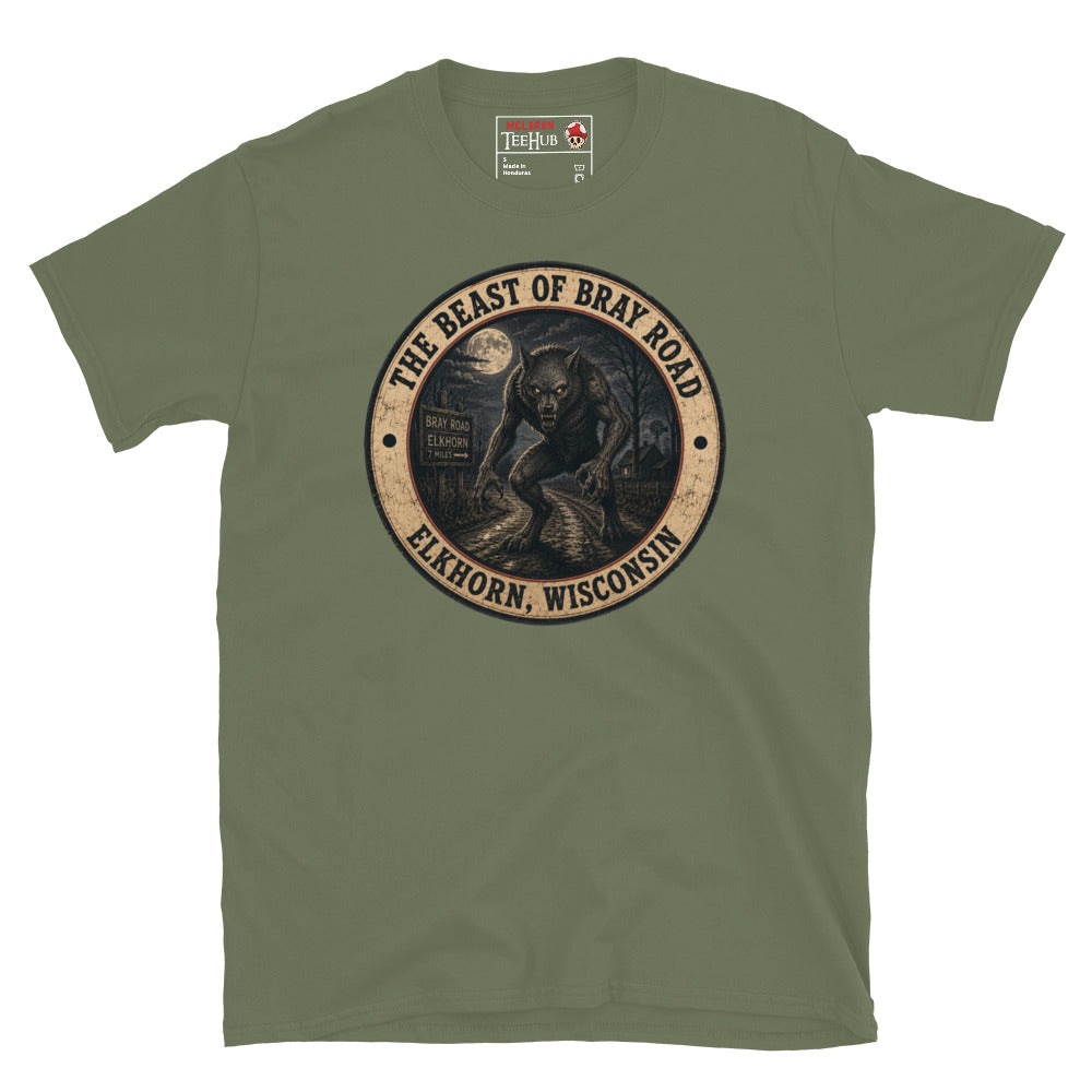 Military Green Beast of Bray Road Elkhorn Wisconsin t-shirt with vintage distressed badge featuring snarling werewolf figure on moonlit road with Bray Road signpost.