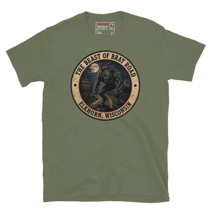 Military Green Beast of Bray Road Elkhorn Wisconsin t-shirt with vintage distressed badge featuring snarling werewolf figure on moonlit road with Bray Road signpost.