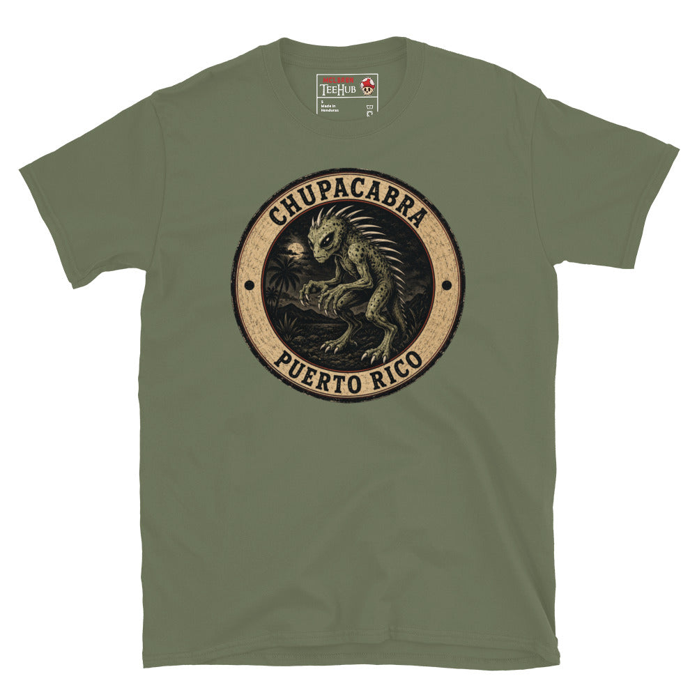 Military Green Chupacabra Puerto Rico t-shirt with vintage distressed badge featuring original reptilian Chupacabra with scaled body dorsal spines alien eyes and claws in tropical night scene.