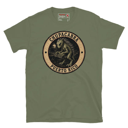 Military Green Chupacabra Puerto Rico t-shirt with vintage distressed badge featuring original reptilian Chupacabra with scaled body dorsal spines alien eyes and claws in tropical night scene.