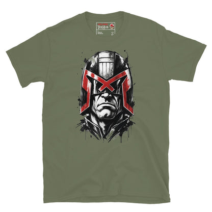 Military Green Judge Dredd t-shirt with dramatic ink splatter portrait featuring iconic helmet and bold red eagle visor with high contrast black ink sketch detail and splatter accents