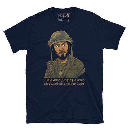 Navy blue t-shirt, Cartoon-style illustration of Kirk Lazarus from Tropic Thunder wearing military gear, with the quote 'I'm a dude playing a dude disguised as another dude' below.