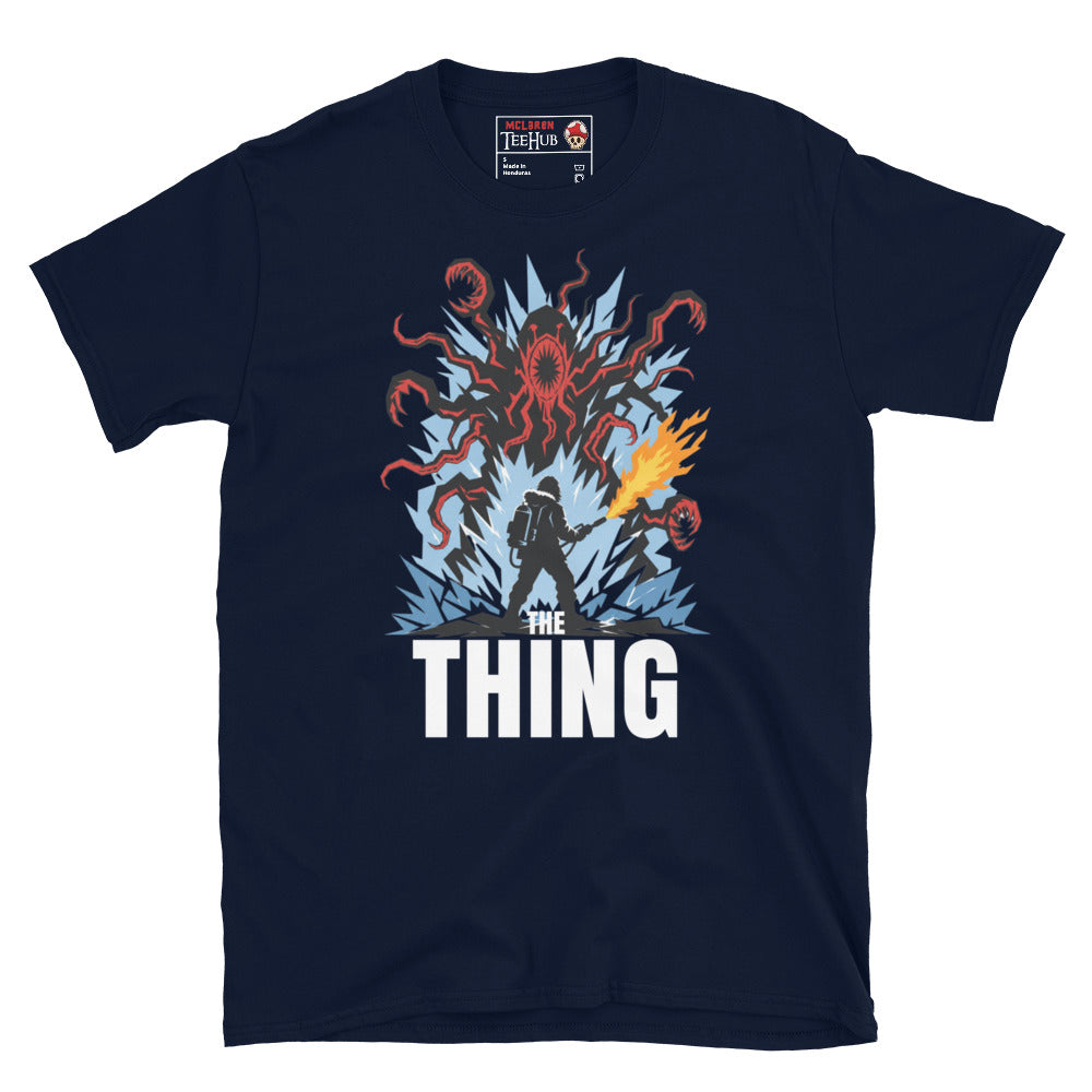 The Thing horror movie t-shirt featuring alien creature artwork and a flamethrower survivor in an Antarctic horror scene. Navy