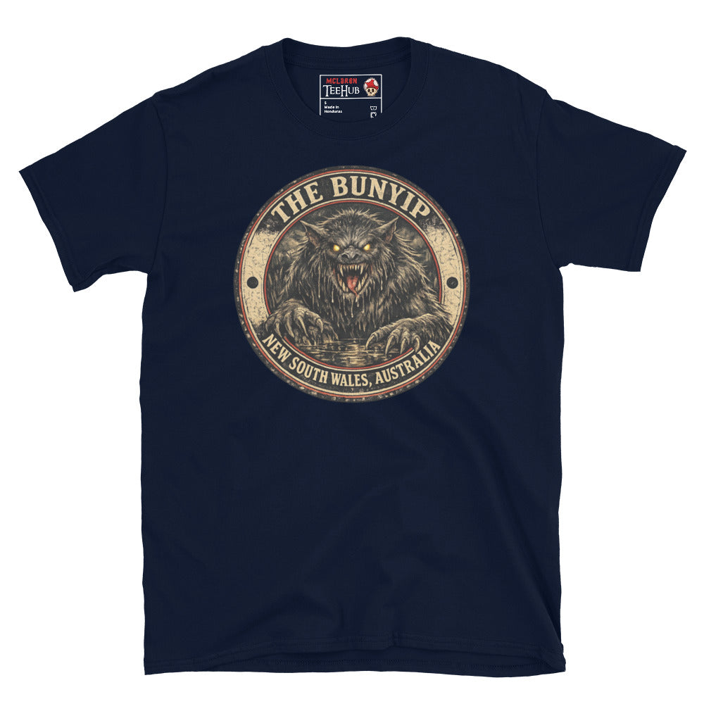 Navy Bunyip New South Wales Australia t-shirt with vintage distressed badge featuring shaggy dark Bunyip rising from water with glowing amber eyes savage fangs and claws.