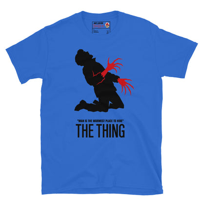The Thing Bennings transformation t-shirt featuring minimalist horror artwork and the quote Man Is The Warmest Place To Hide. Royal Blue 