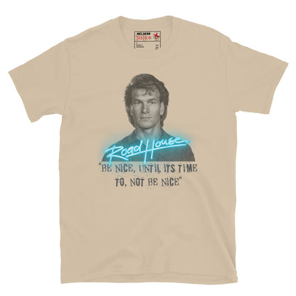 Road House Sand T-shirt featuring Patrick Swayze as Dalton with the quote “Be Nice Until It’s Time to Not Be Nice” in neon style.
