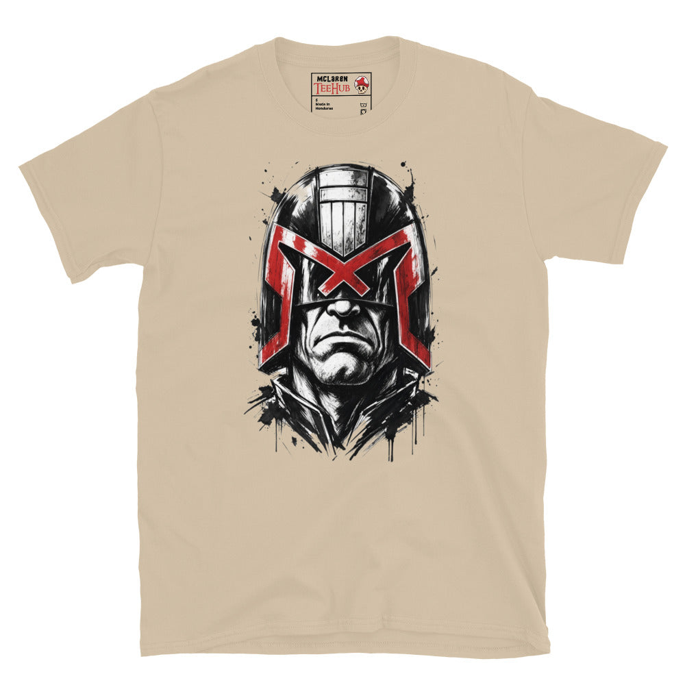 Sand Judge Dredd t-shirt with dramatic ink splatter portrait featuring iconic helmet and bold red eagle visor with high contrast black ink sketch detail and splatter accents