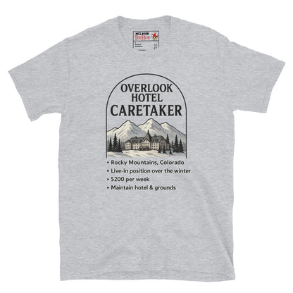 Sport grey T-shirt featuring a faux job ad for the Overlook Hotel caretaker position with mountains and hotel graphic, inspired by The Shining.