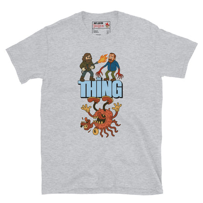Sport Grey T-shirt with a cartoon parody design of The Thing featuring MacReady with a flamethrower and a mutated creature.