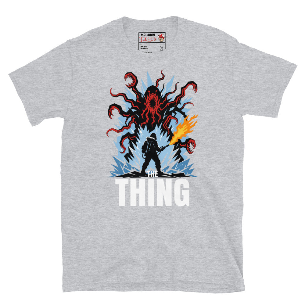 The Thing horror movie t-shirt featuring alien creature artwork and a flamethrower survivor in an Antarctic horror scene. Sport Grey 