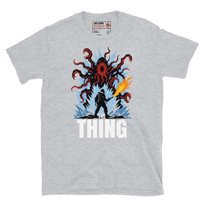 The Thing horror movie t-shirt featuring alien creature artwork and a flamethrower survivor in an Antarctic horror scene. Sport Grey 