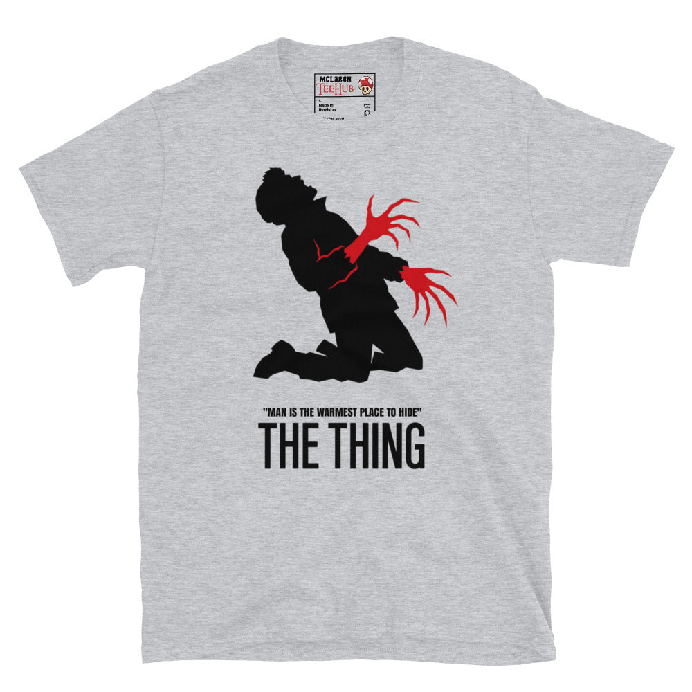 The Thing Bennings transformation t-shirt featuring minimalist horror artwork and the quote Man Is The Warmest Place To Hide. Sport Grey 