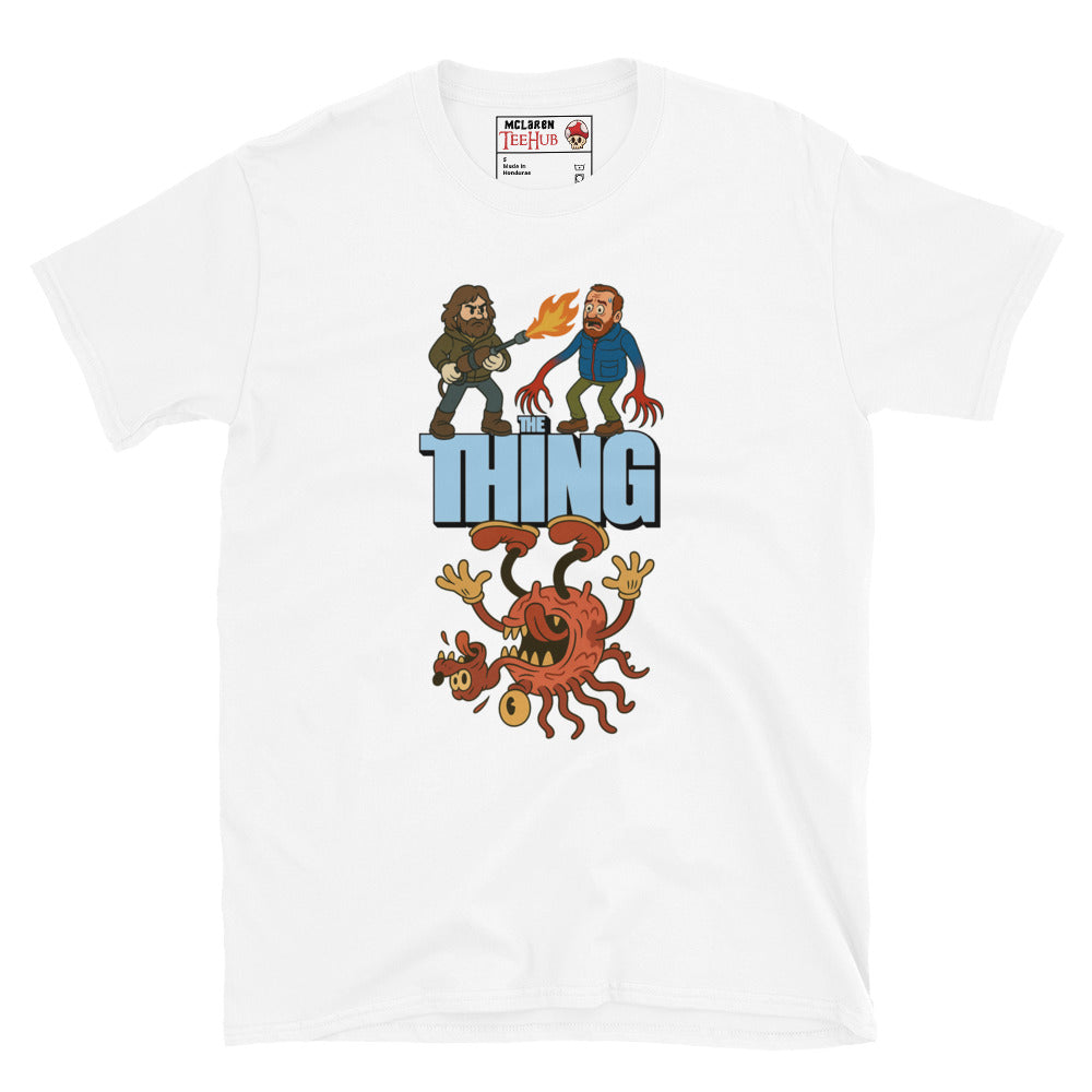 White T-shirt with a cartoon parody design of The Thing featuring MacReady with a flamethrower and a mutated creature.