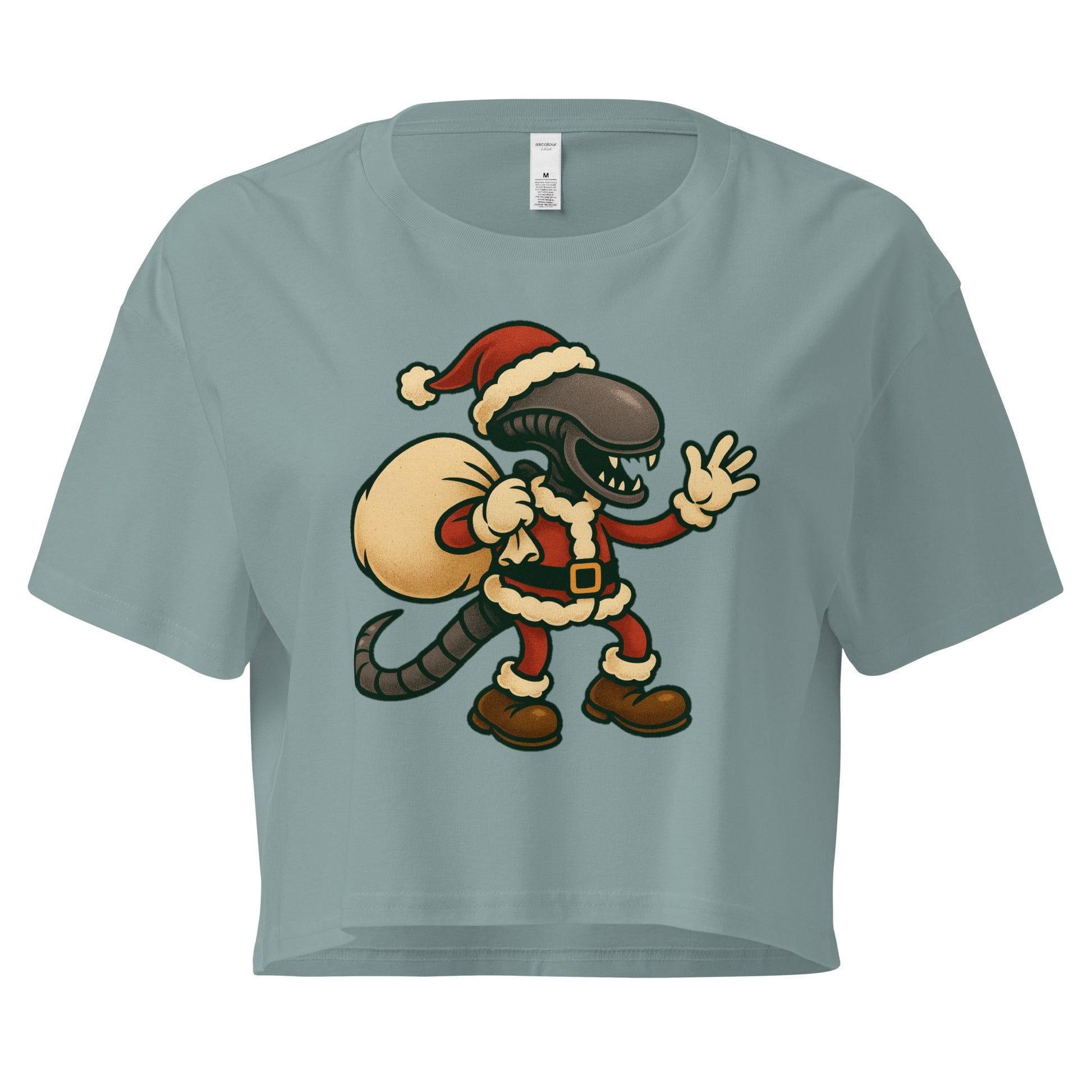 Cartoon Xenomorph in Santa suit holding gift sack – funny Alien Christmas crop top. Mineral colour